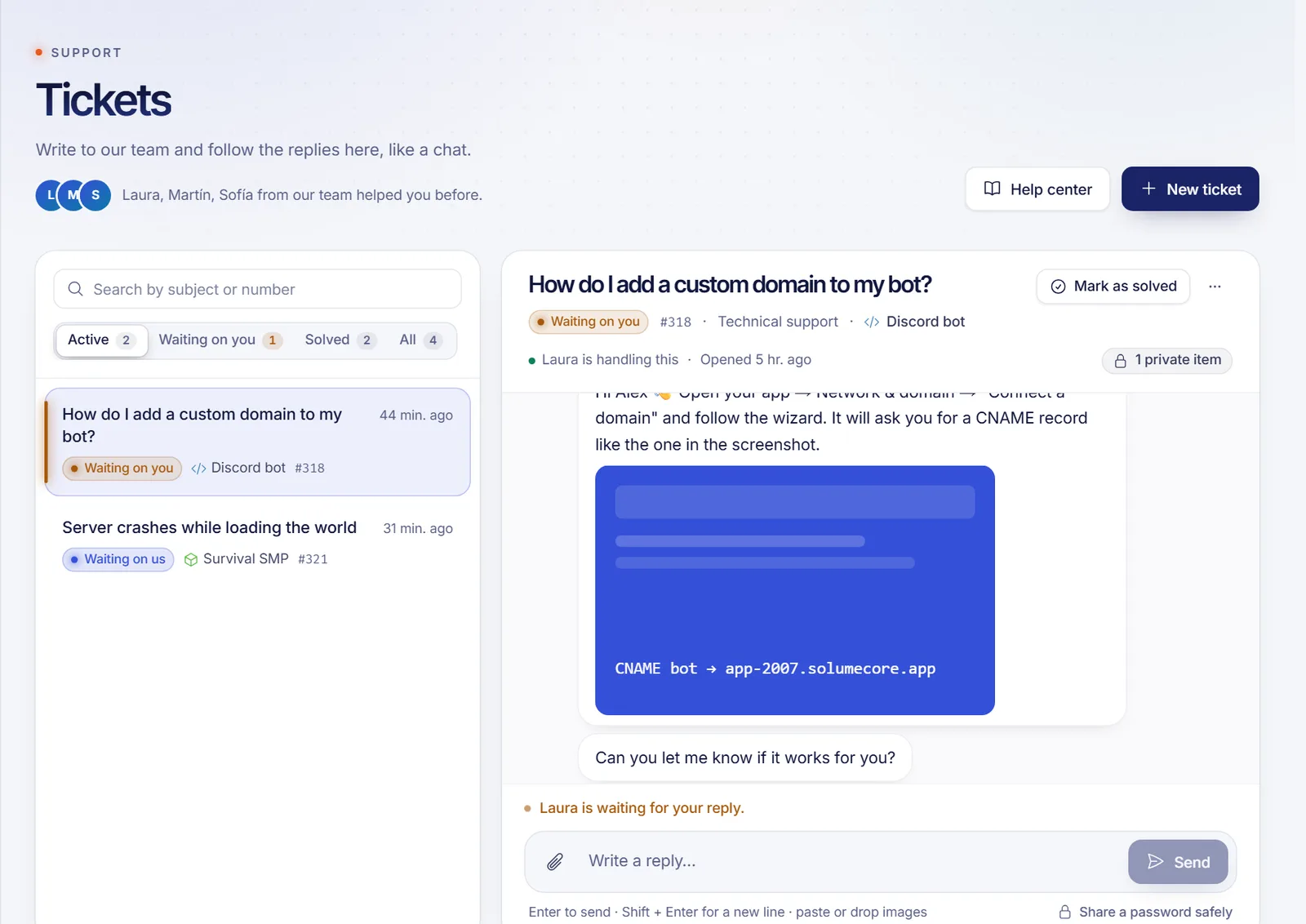 A ticket conversation in the dashboard with the status badge at the top, the message thread and the reply box